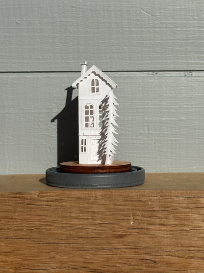 hand made miniature paper house with tree