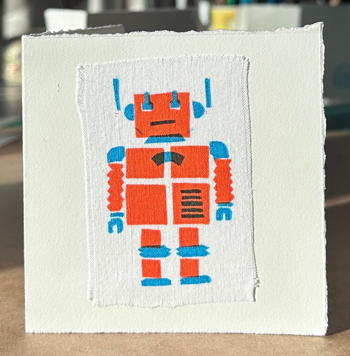 Orange Robot with blue highlights.