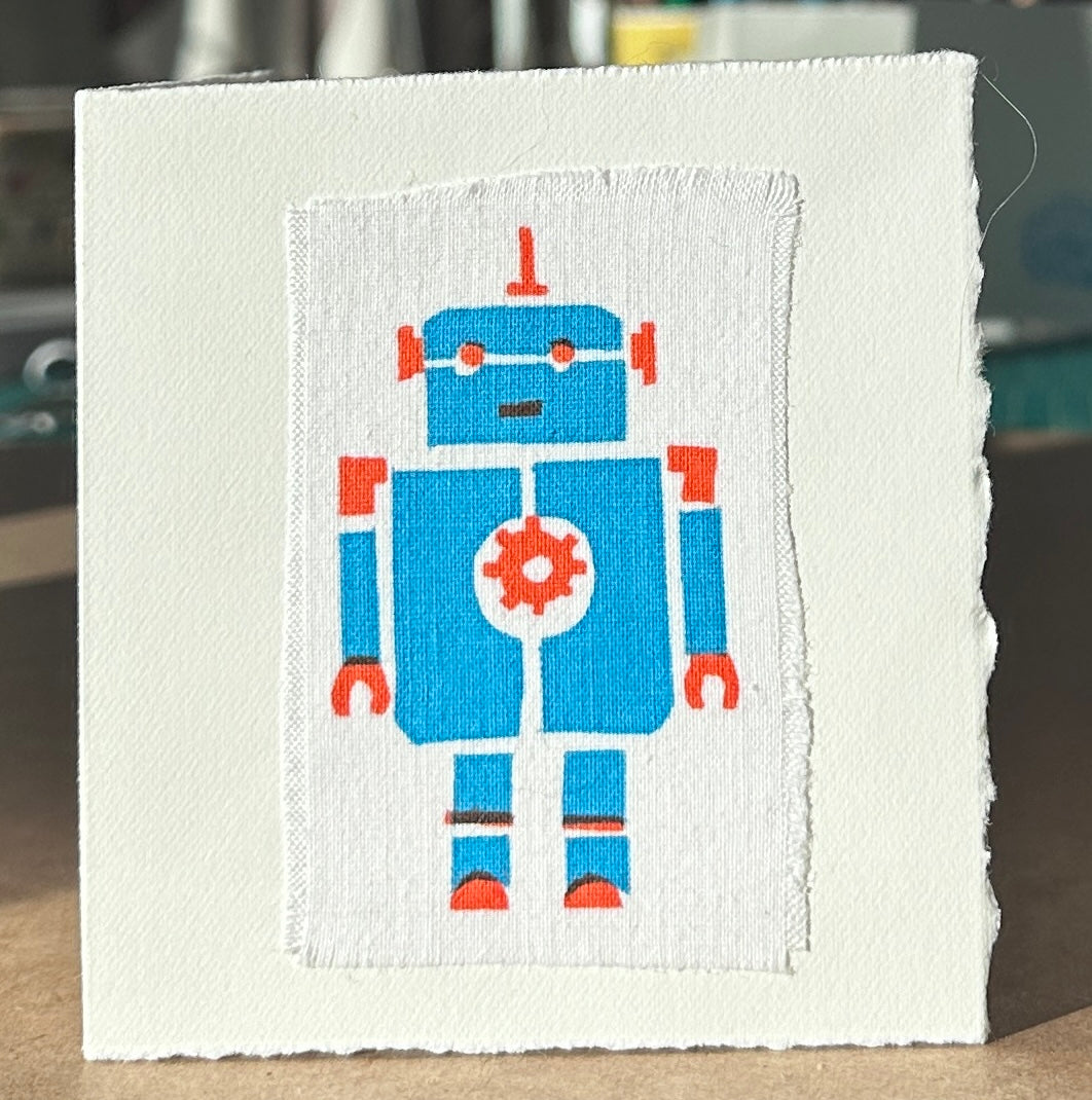 Blue Robot with orange highlights.