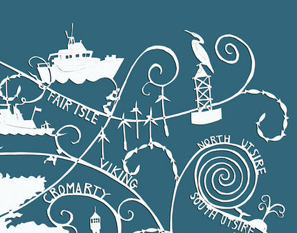 An detail of a papercut  map of UK and shipping forecast names, showing a cormorant and a lifeboat, white on a dark turquoise background.