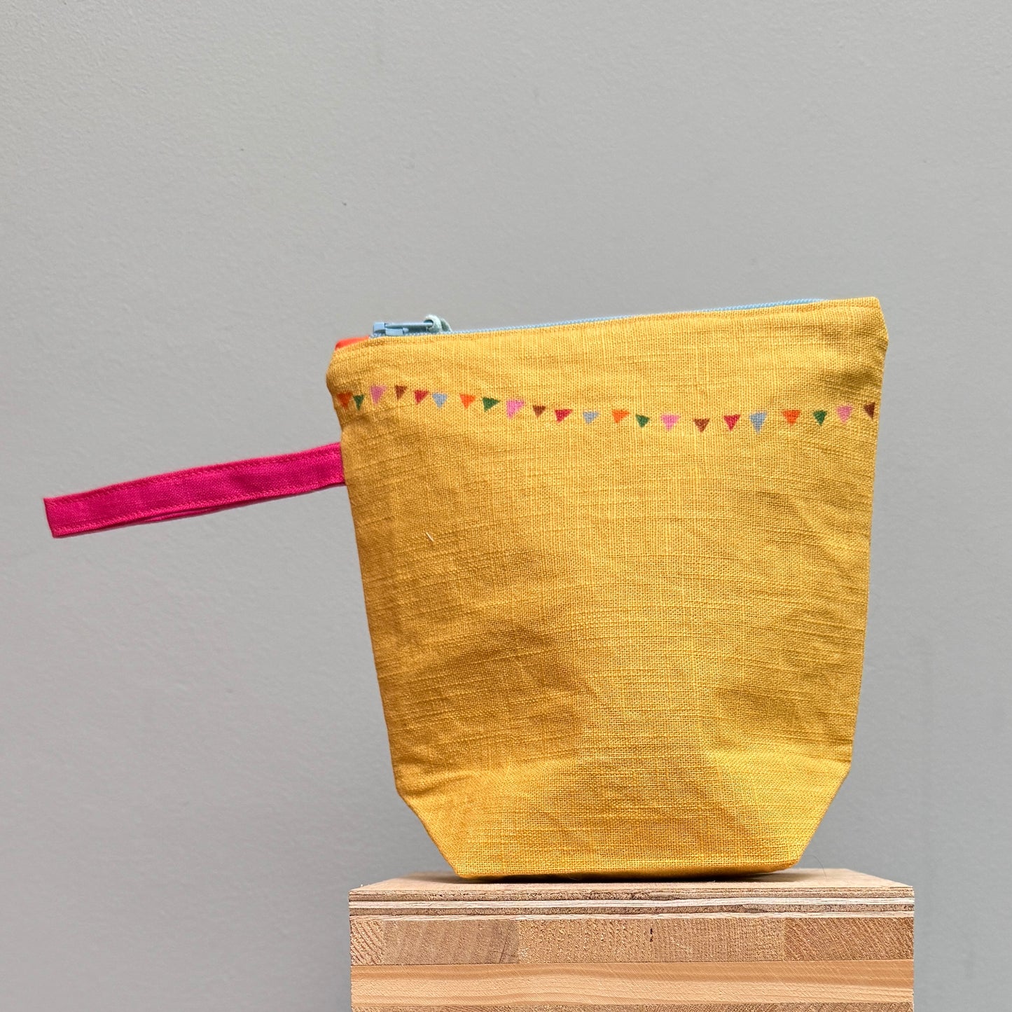 Doris and Stripes watch the Bunting with Boxed Base  on Yellow IV