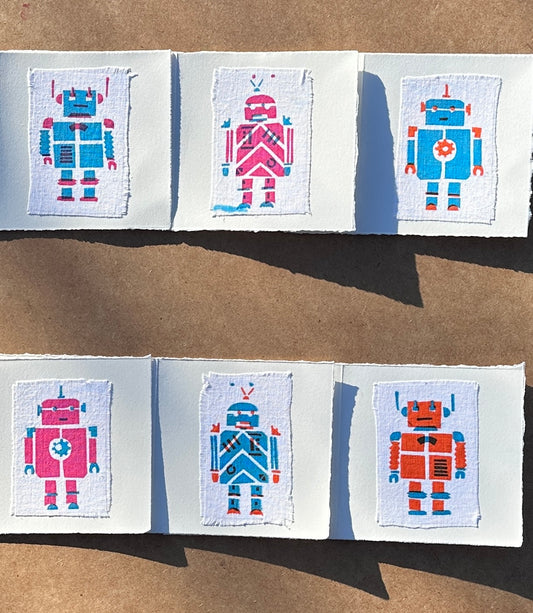 6 cards with different Robot prints in blue pink and orange