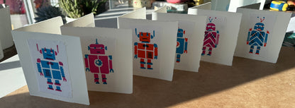 6 Robot cards standing.